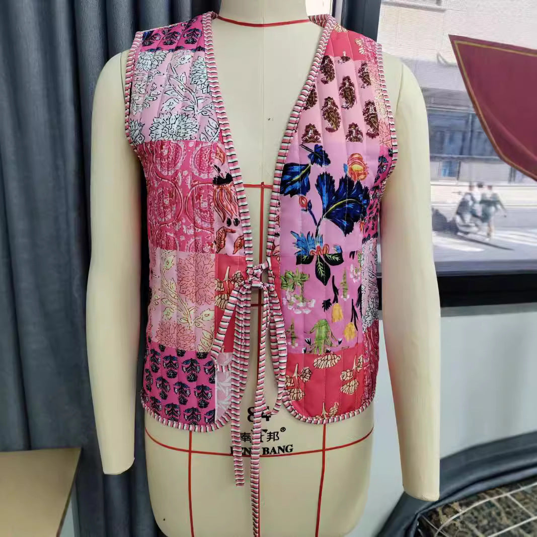 Ladies patchwork vest with tie belt, striped interior finish and contrast piping Chichicherry