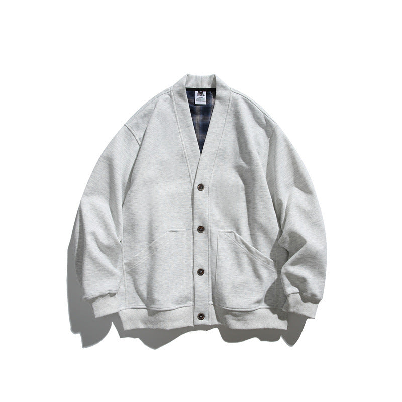 Unisex Oversized cardigan jacket made of heavyweight French terry with V-neck and patch pockets