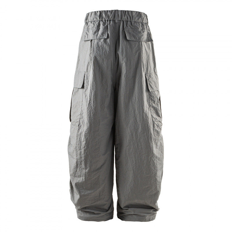 Unisex Wide Cropped Cargo Pants with Elastic Waistband, Drawstring and Overlay Pockets Chichicherry