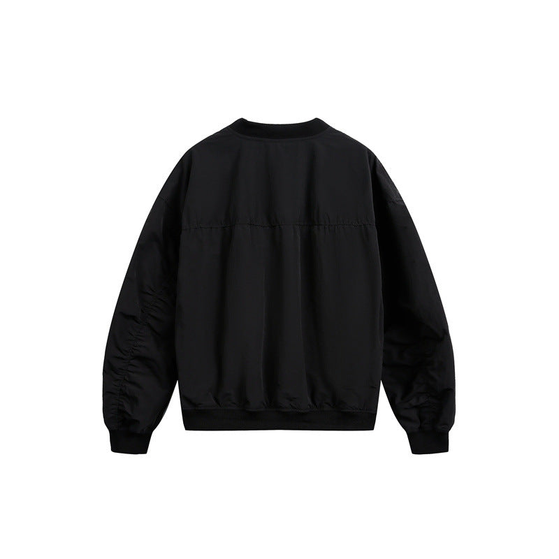 Unisex short cut lightweight nylon bomber jacket with utility pockets and ribbed hem Chichicherry