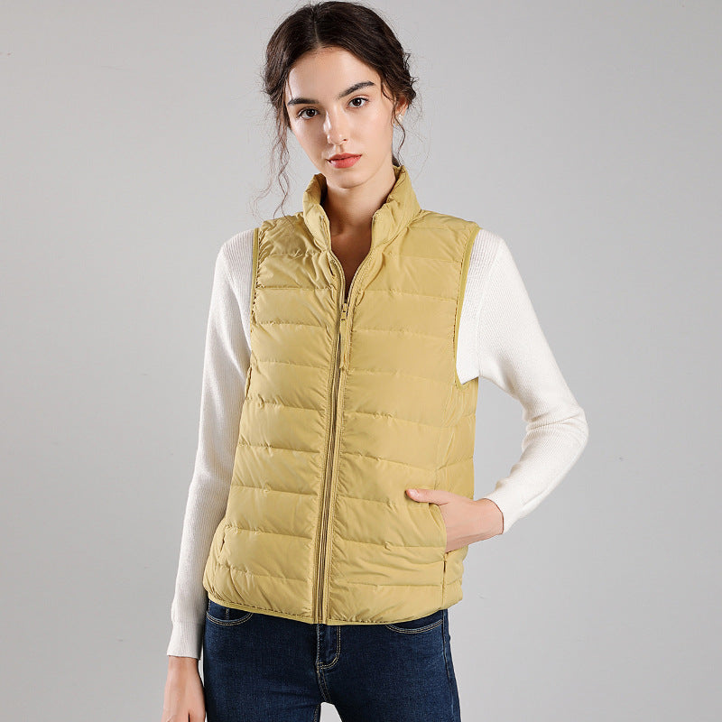 Women's packable quilted vest with flat down look, stand-up collar and side slip pockets Chichicherry