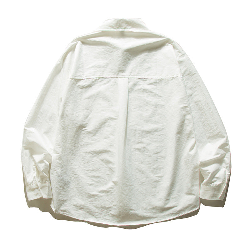 Unisex Oversize cotton shirt with boxy cut, breast pocket, and rounded hem Chichicherry