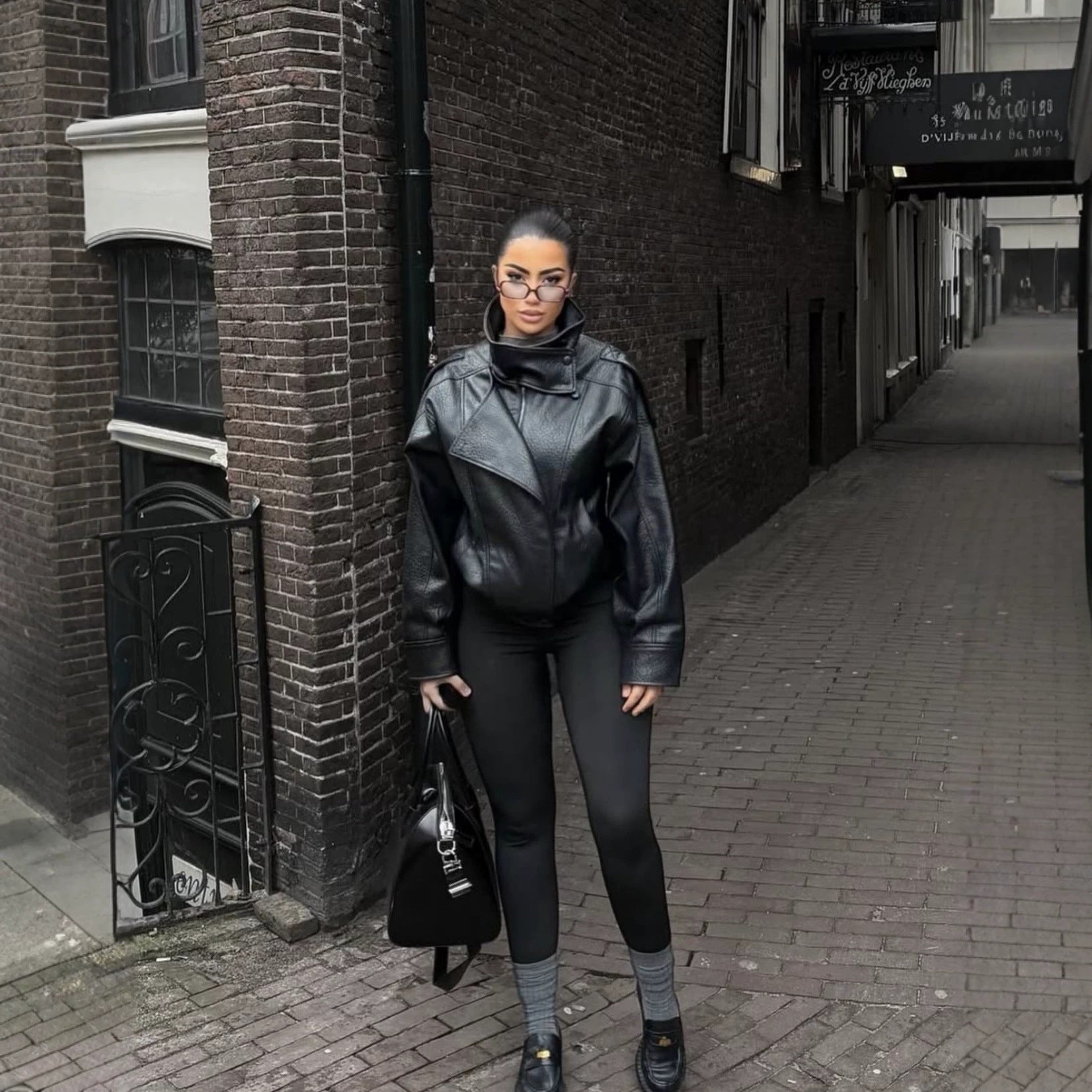 Women's cropped leather blouson with high stand collar, boxy silhouette, and voluminous sleeves Chichicherry