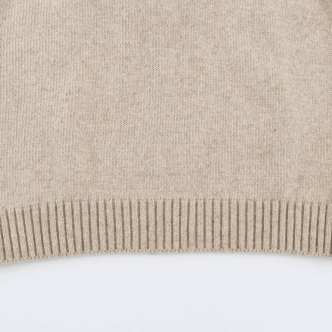 Women's fine knit vest with hood, button placket, and ribbed waistband Chichicherry