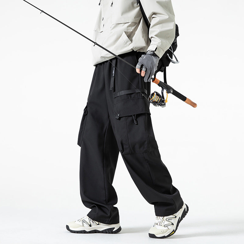 Men's wide technical cargo pants with multiple pockets, water-repellent ripstop and adjustable drawstring waistband Chichicherry