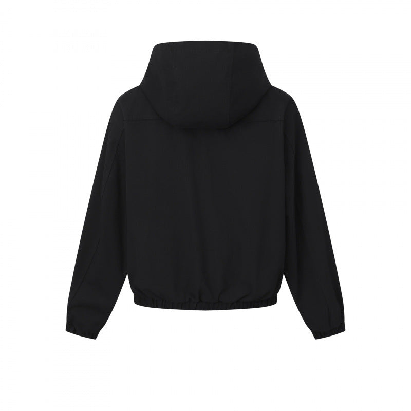 Ladies short cut hooded blouson jacket with textured fabric, patch pockets, and elastic hem Chichicherry