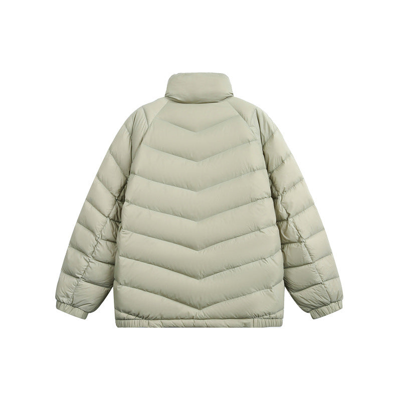 Unisex Short cut padded jacket in boxy fit with chevron quilting and high collar Chichicherry