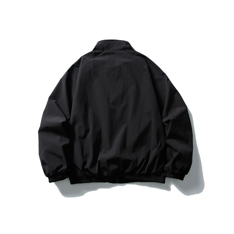 Unisex Lightweight water-repellent windbreaker with stand-up collar, raglan sleeves, and elastic hem Chichicherry