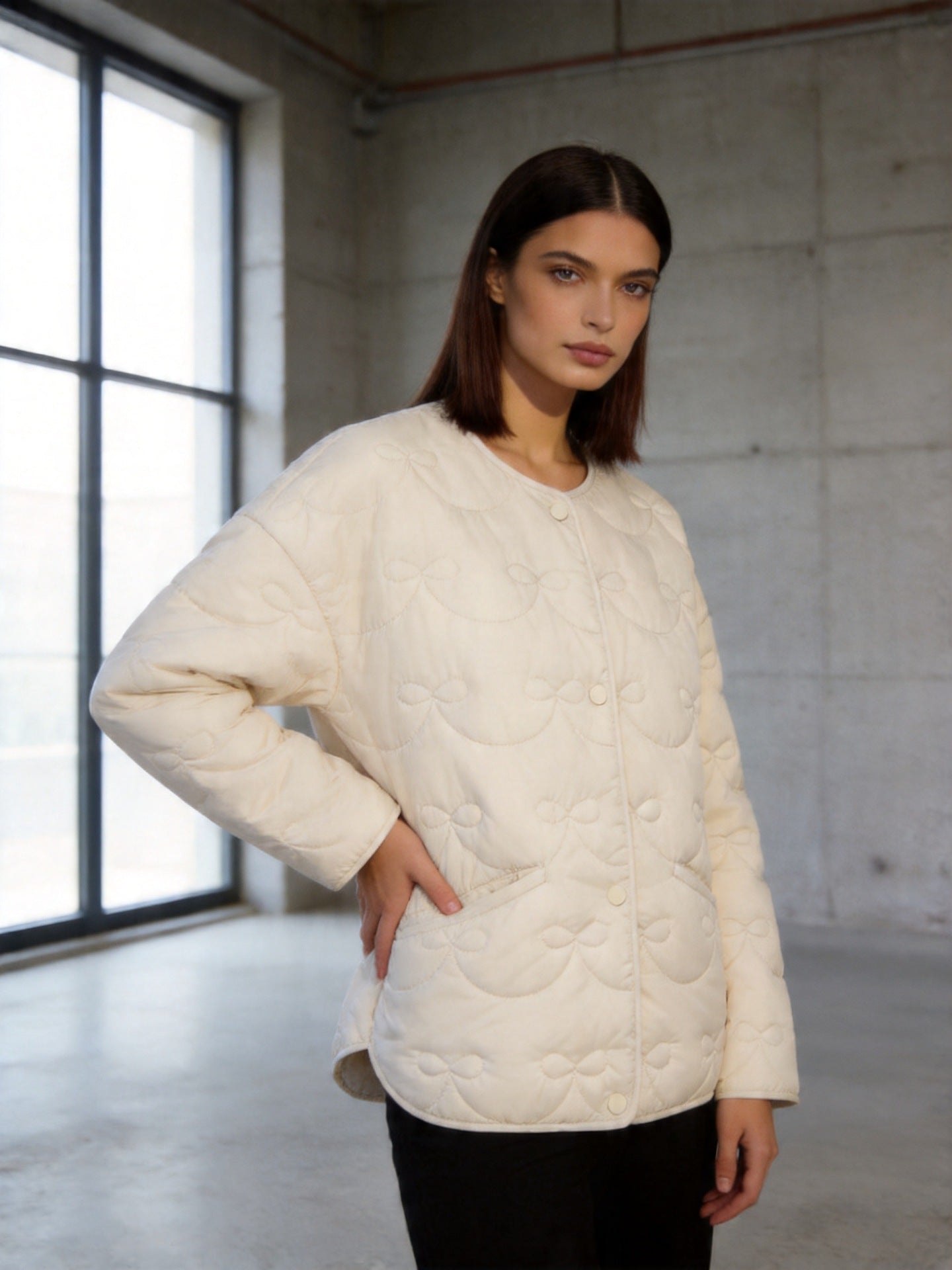 Women’s quilted jacket without collar with decorative bow quilting and snap button closure Chichicherry