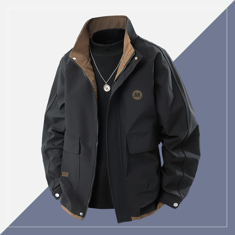 Men's short cut softshell utility jacket with stand-up collar and flap pockets Chichicherry