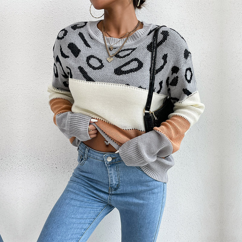 Women's oversized fine knit pullover with leopard jacquard, block stripes & open seam
