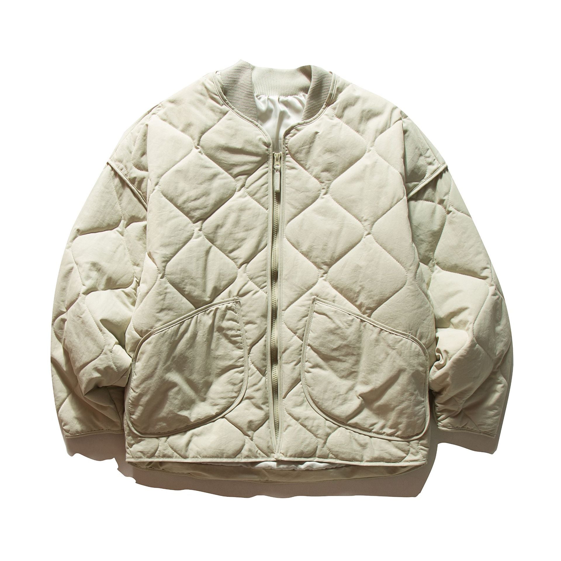 Unisex Short quilted bomber in boxy cut with ribbed collar and extra large flap pockets Chichicherry