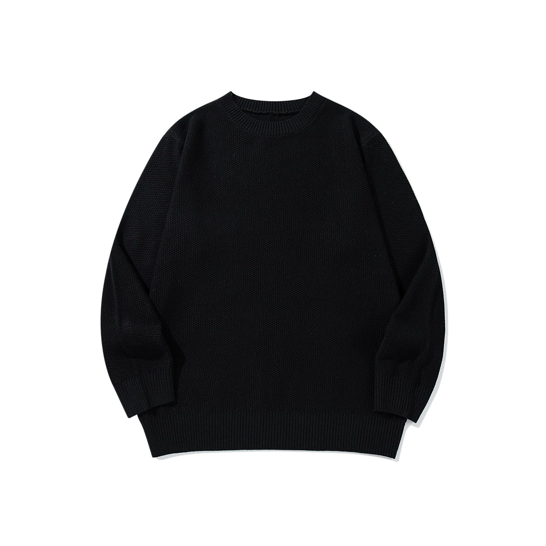 Unisex chunky knit round neck sweater with textured purl stitch and ribbed cuffs