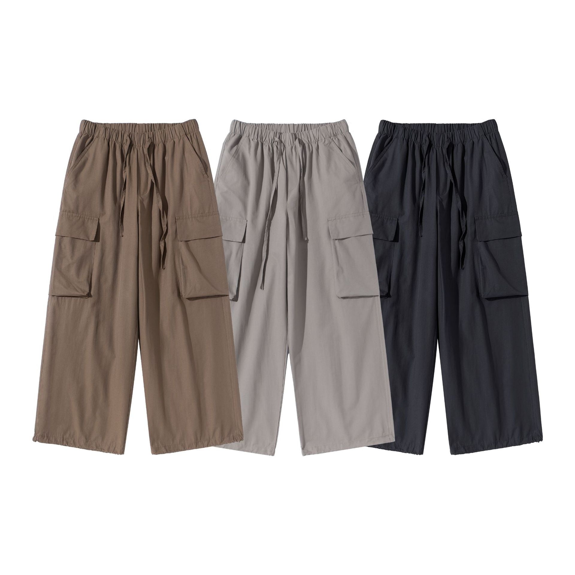 Women's culotte cargo bermudas in utility look with elastic tunnel drawstring waistband and large flap pockets.
