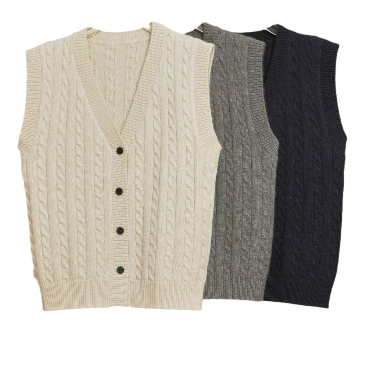 Women's chunky knit cable vest with deep V-neck and button placket Chichicherry