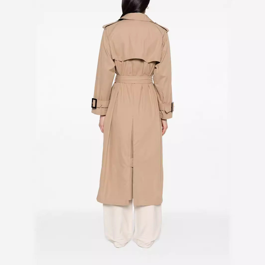 Women's trench coat in maxi length with double-breasted button placket and waist belt Chichicherry