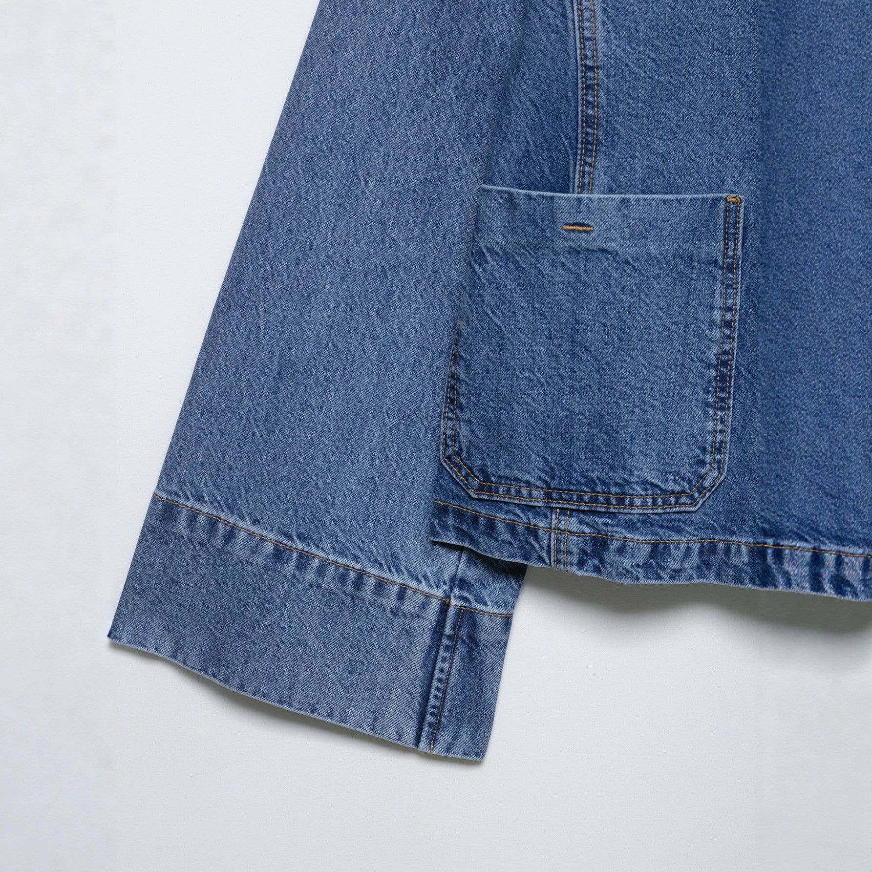 Women's Cropped Oversized Denim Jacket with Large Patch Pockets and Visible Button Placket Chichicherry
