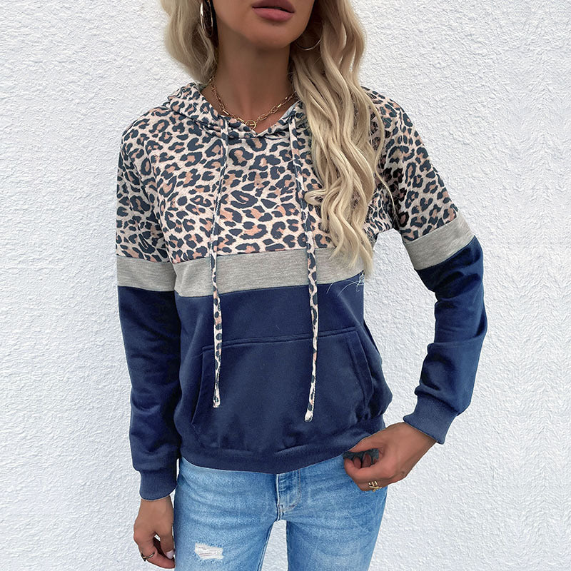 Women's hooded sweatshirt in block design with leopard pattern, kangaroo pocket and drawstring hood
