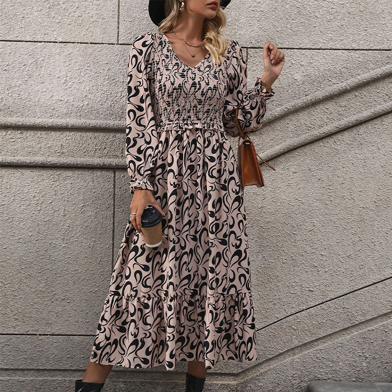Ladies max dress with smock detail, V-neck and ruffle tiers Chichicherry