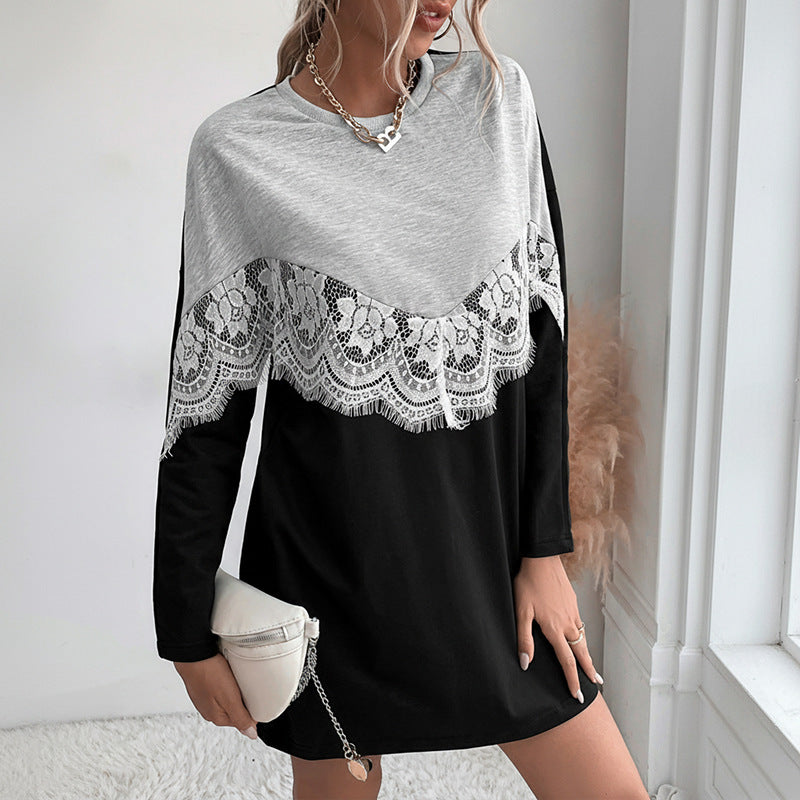 Ladies sweat dress in color block style with lace V yoke and rounded hem