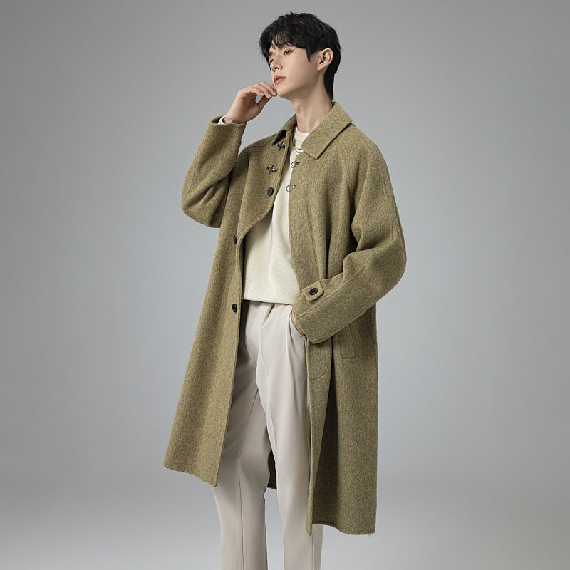 Men's floor-length wool blend coat in oversized cut with distinctive hook closures Chichicherry