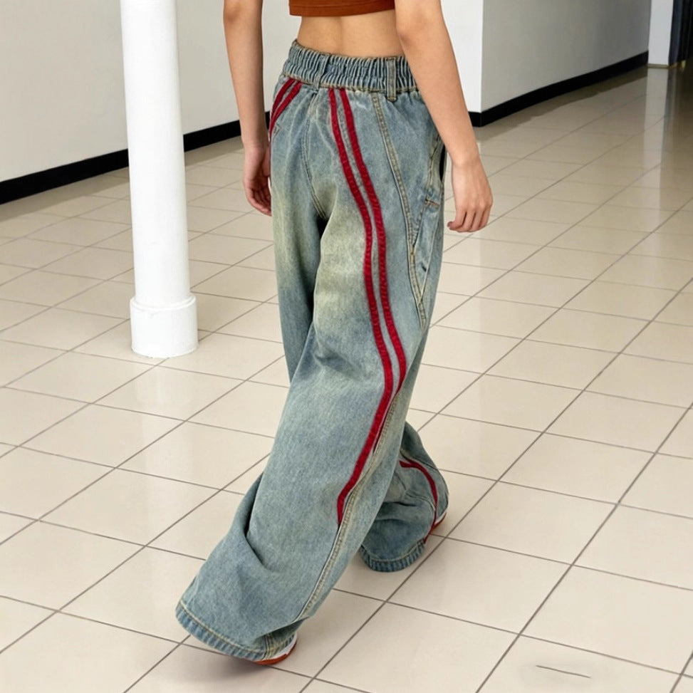 Women's low-rise extra-wide baggy jeans made of vintage denim with side tape stripes Chichicherry
