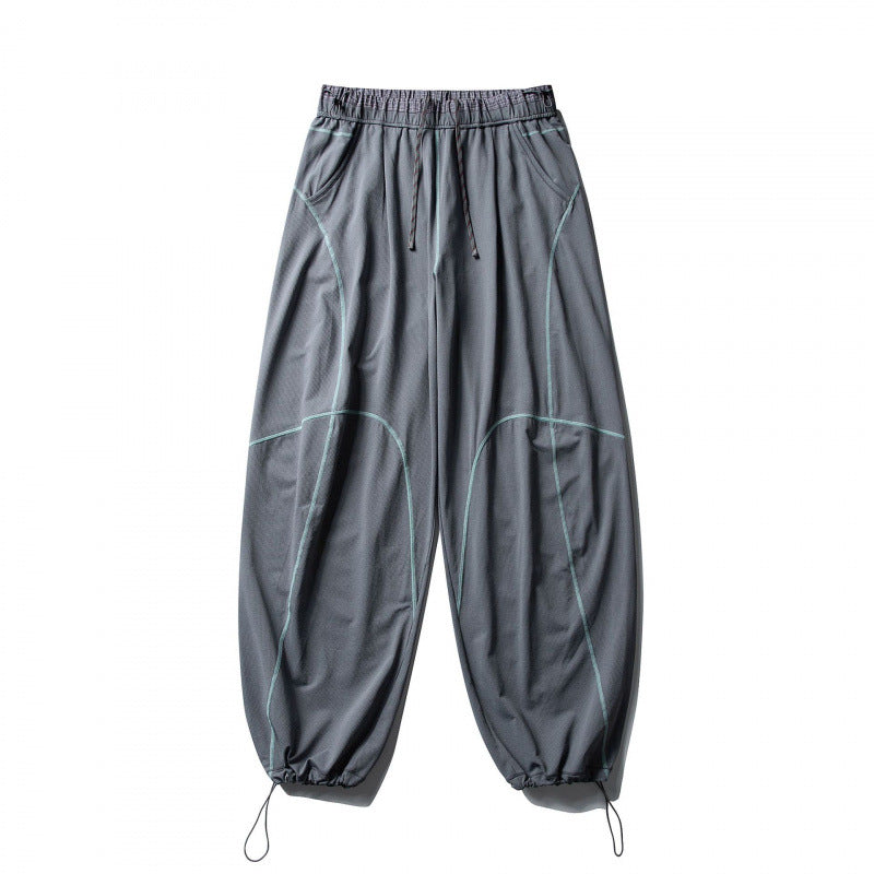 Unisex locker cut tech jogging pants with elastic waistband, distinctive flatlock seams and drawstring Chichicherry