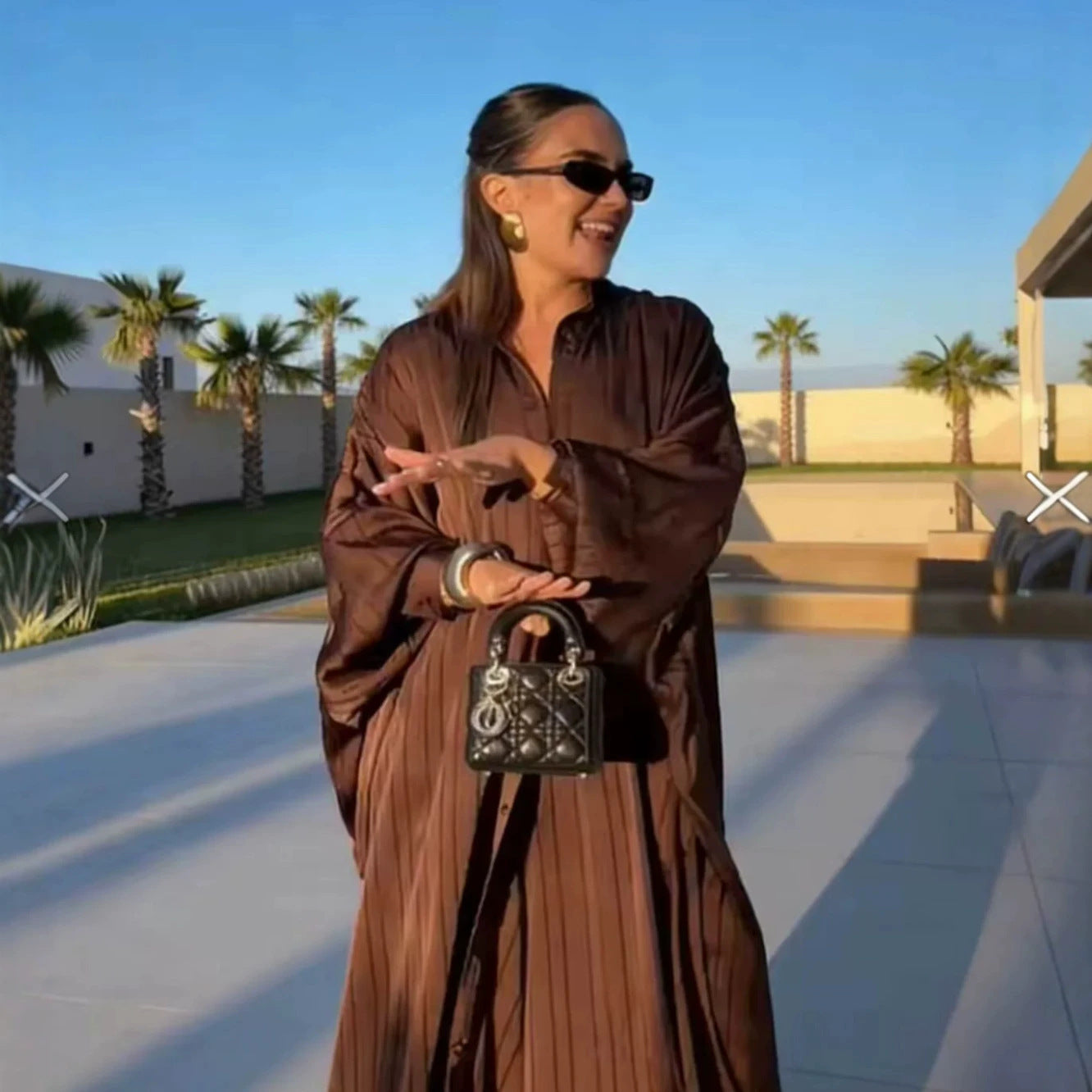 Women’s maxi dress in pleated kaftan style with oversized sleeves and button placket Chichicherry