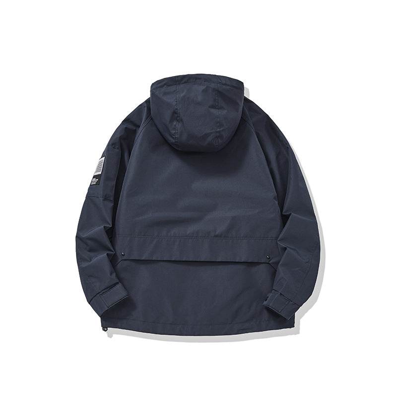 Unisex multifunctional outdoor parka in boxy cut with adjustable hood and asymmetrical zip pockets Chichicherry