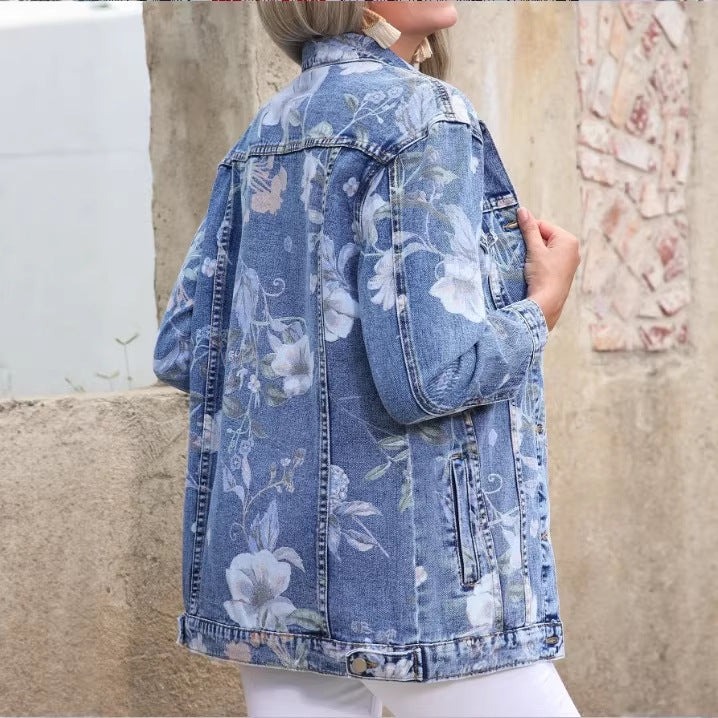 Women’s Longer Denim Jacket with Floral Allover Print, Chest Flap Pockets, and Casual Oversized Fit Chichicherry