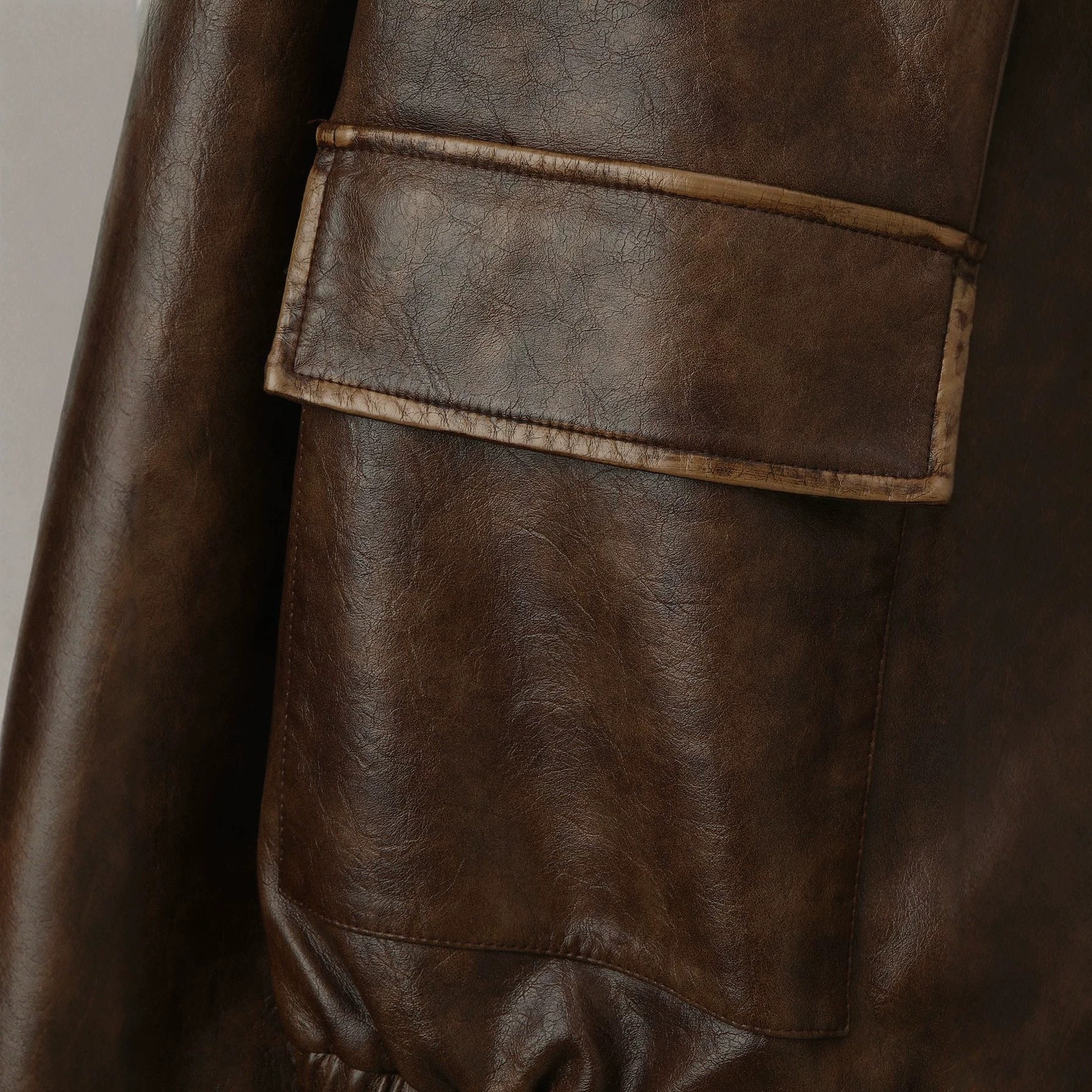 Men's Vintage Leather Bomber Jacket with Stand Collar, Flap Pockets and Elastic Waist Chichicherry