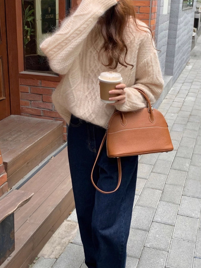 Women structured leather handbag with detachable shoulder strap and rounded body shape Chichicherry