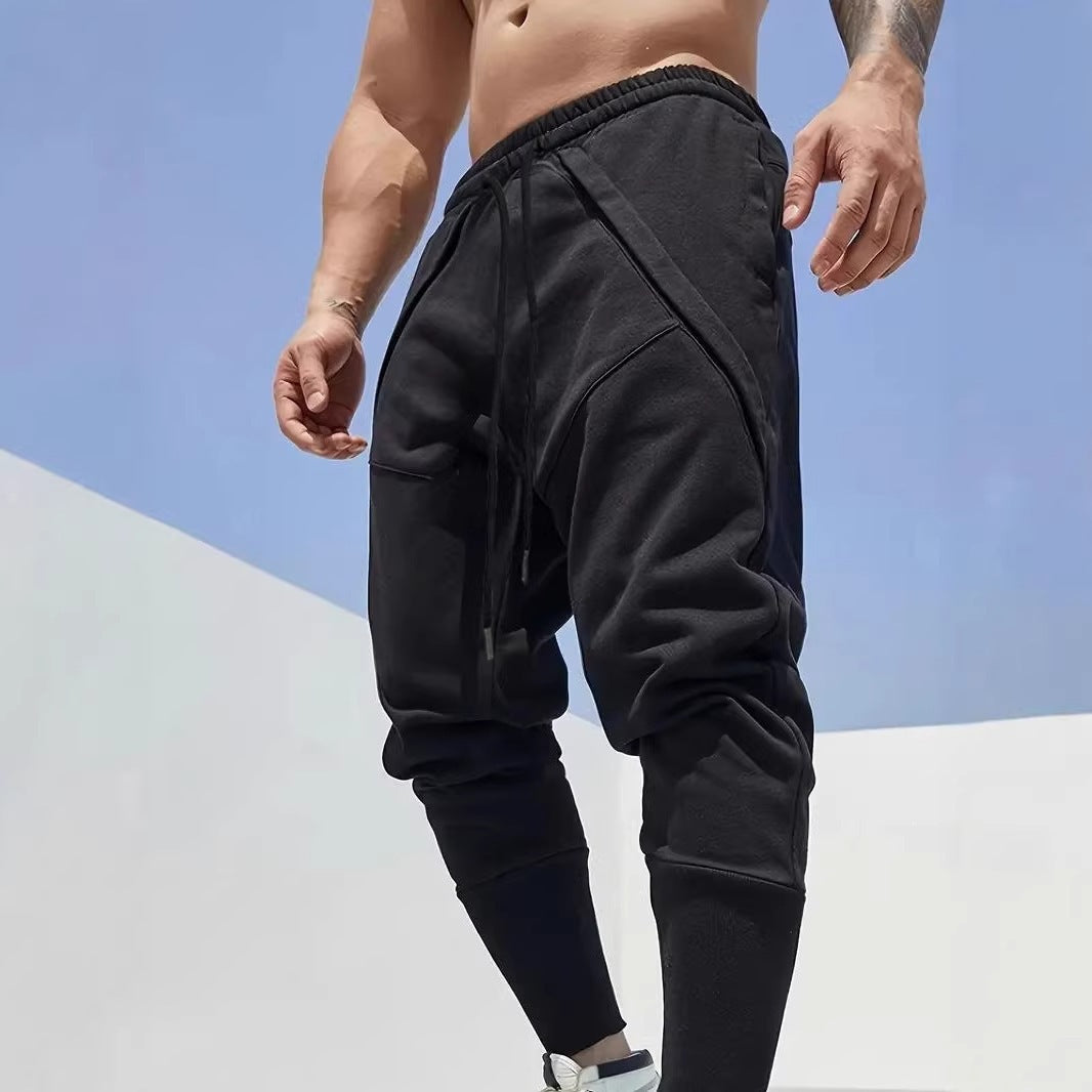 Men's Tapered Jogging Pants with Drop Crotch, Elastic Waistband & Diagonally Placed Pockets Chichicherry