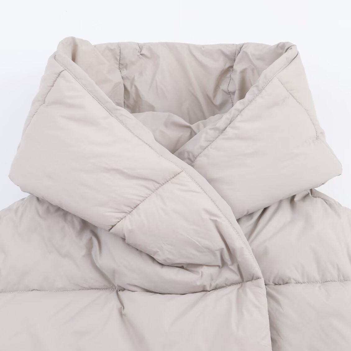 Women short cut oversized quilted jacket with high wrap collar and padded lining Chichicherry