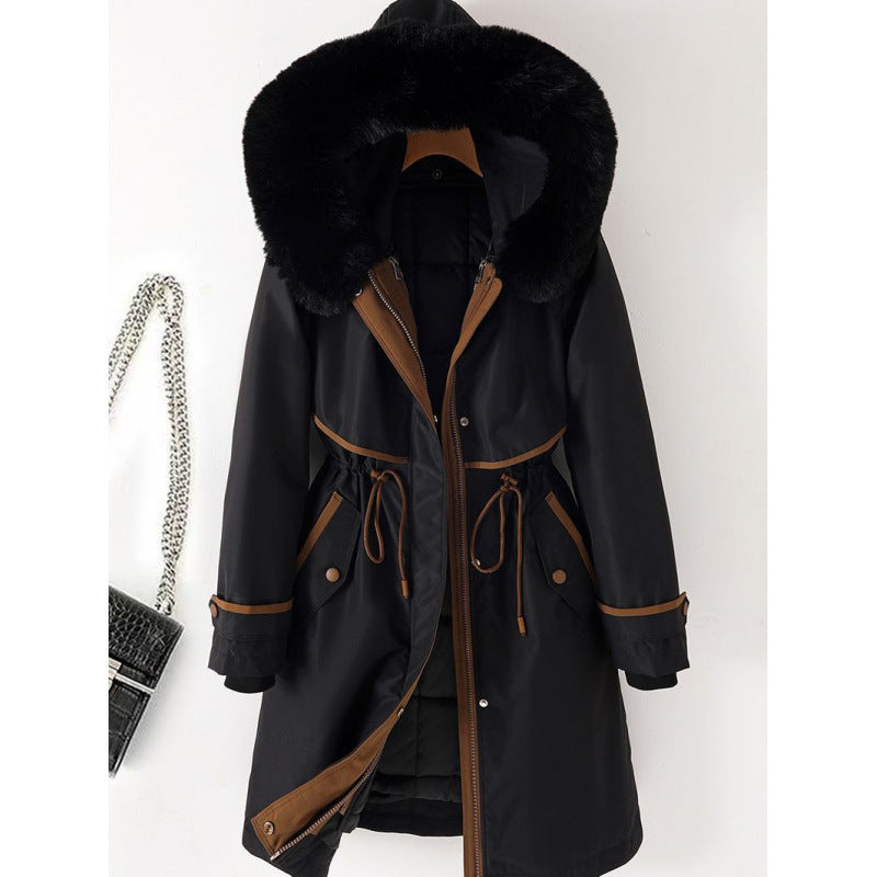 Women's long parka with faux fur hood, waist drawstring, and contrasting piping Chichicherry