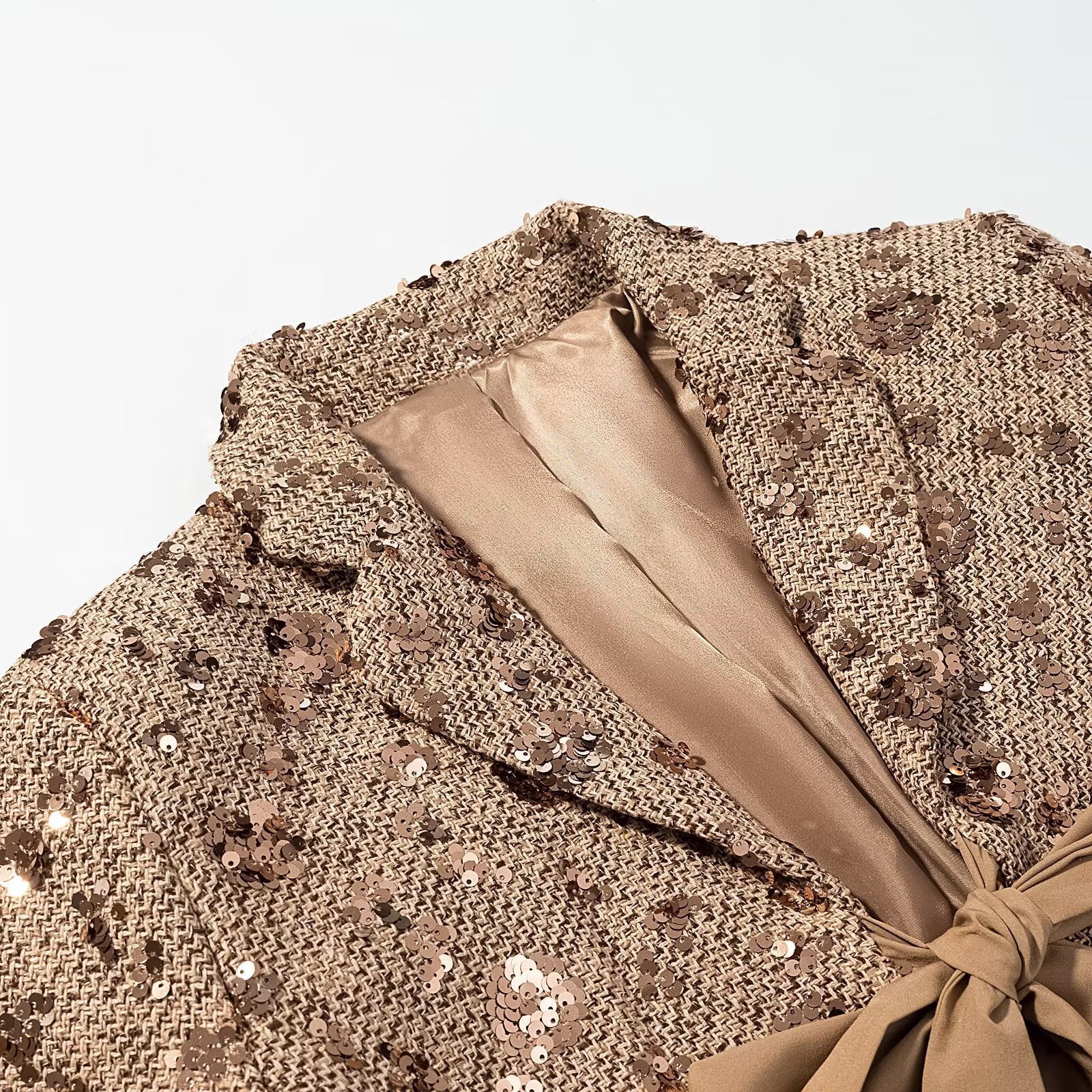 Women's short blazer made of tweed with sequin trim and bow closure Chichicherry
