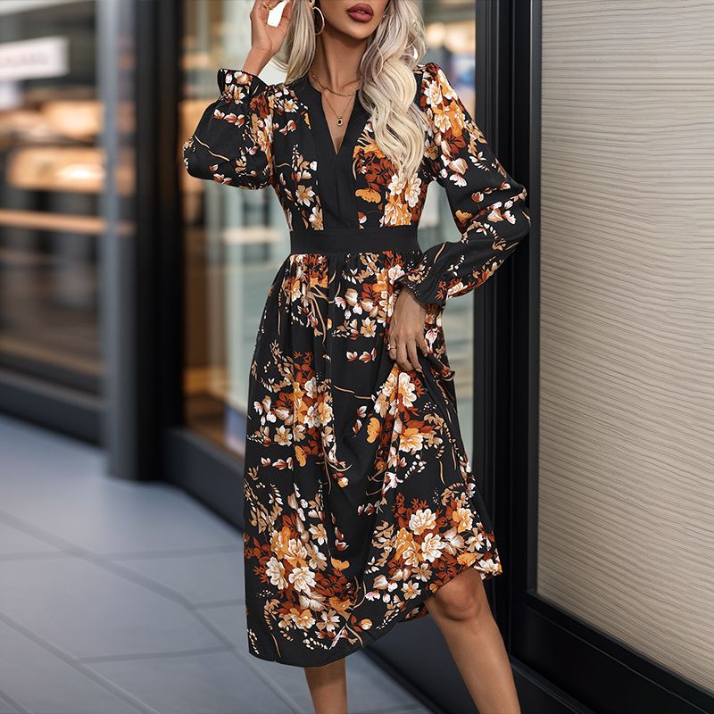 Women’s midi dress with fitted waist, V-neck, long sleeves, and floral all-over print Chichicherry