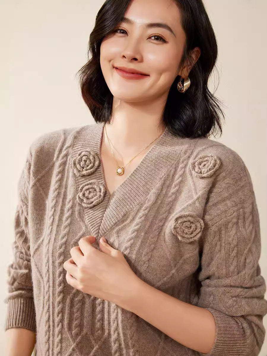Women's cable knit V-neck sweater with three-dimensional floral appliqués made from soft wool blend Chichicherry