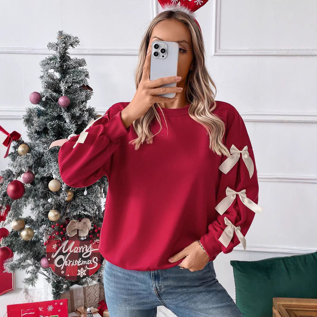 Women's sweatshirt with decorative bows on the sleeves Chichicherry