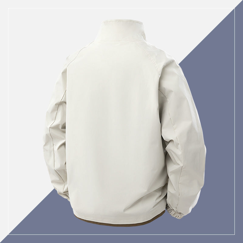 Men's short cut softshell utility jacket with stand-up collar and flap pockets Chichicherry
