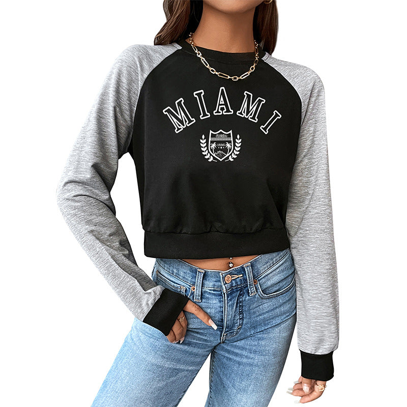 Women Short-Cropped College Sweatshirt with Raglan Sleeves and Elastic Hem Chichicherry