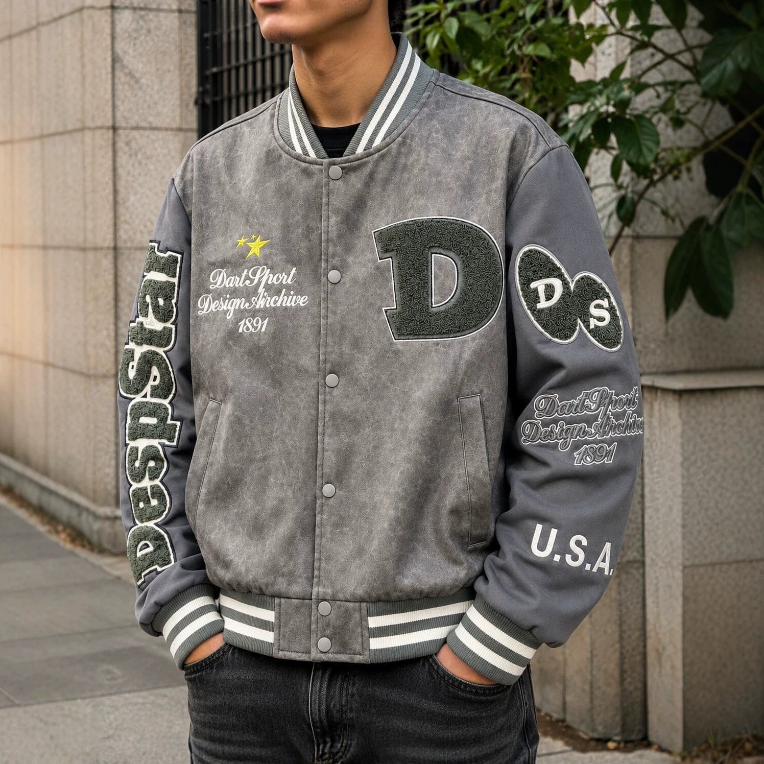 Men's varsity bomber jacket in college style made of faux leather with appliqués Chichicherry