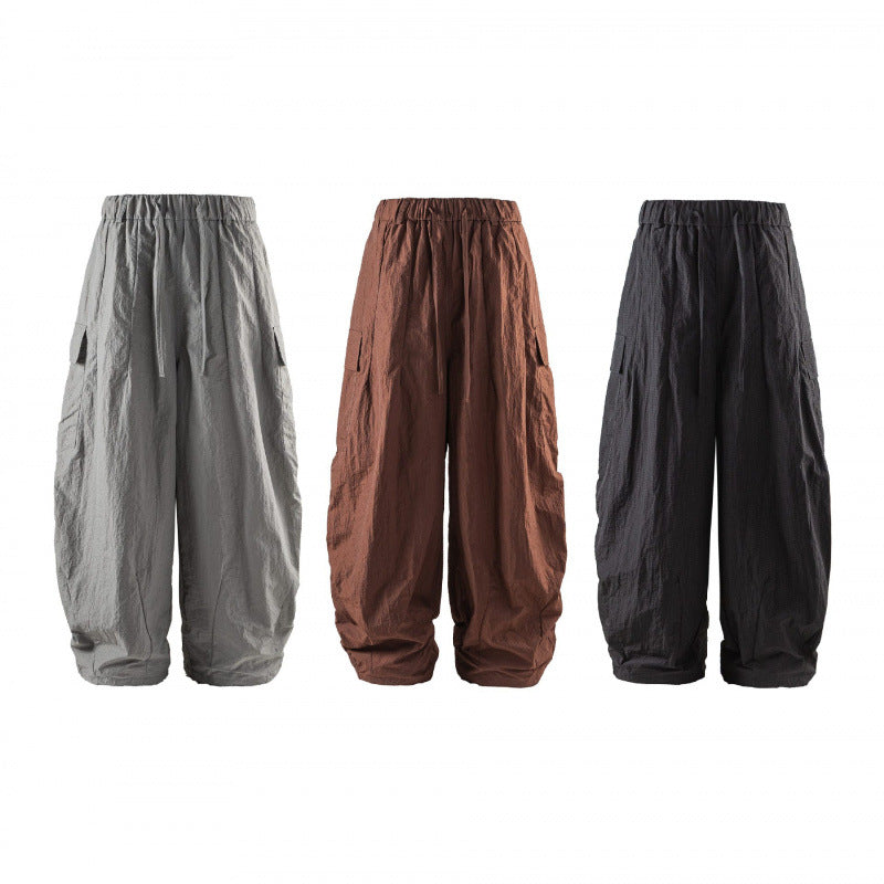 Unisex Wide Cropped Cargo Pants with Elastic Waistband, Drawstring and Overlay Pockets Chichicherry