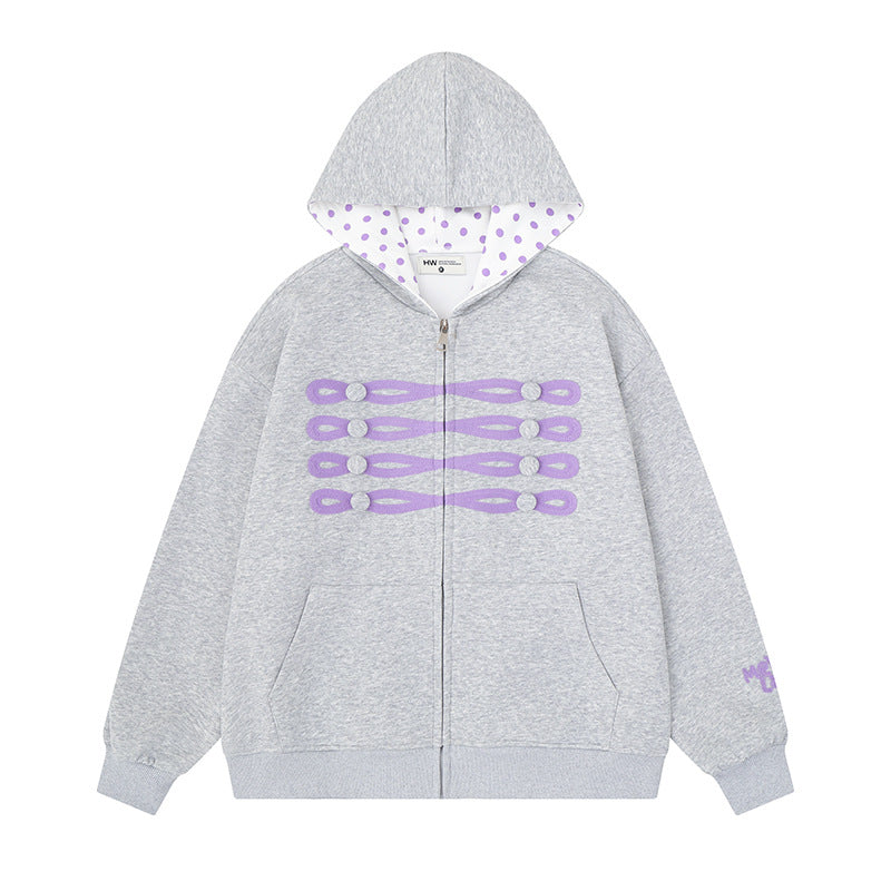 Women's oversized hooded sweatshirt jacket with decorative button print and polka dot hood lining Chichicherry