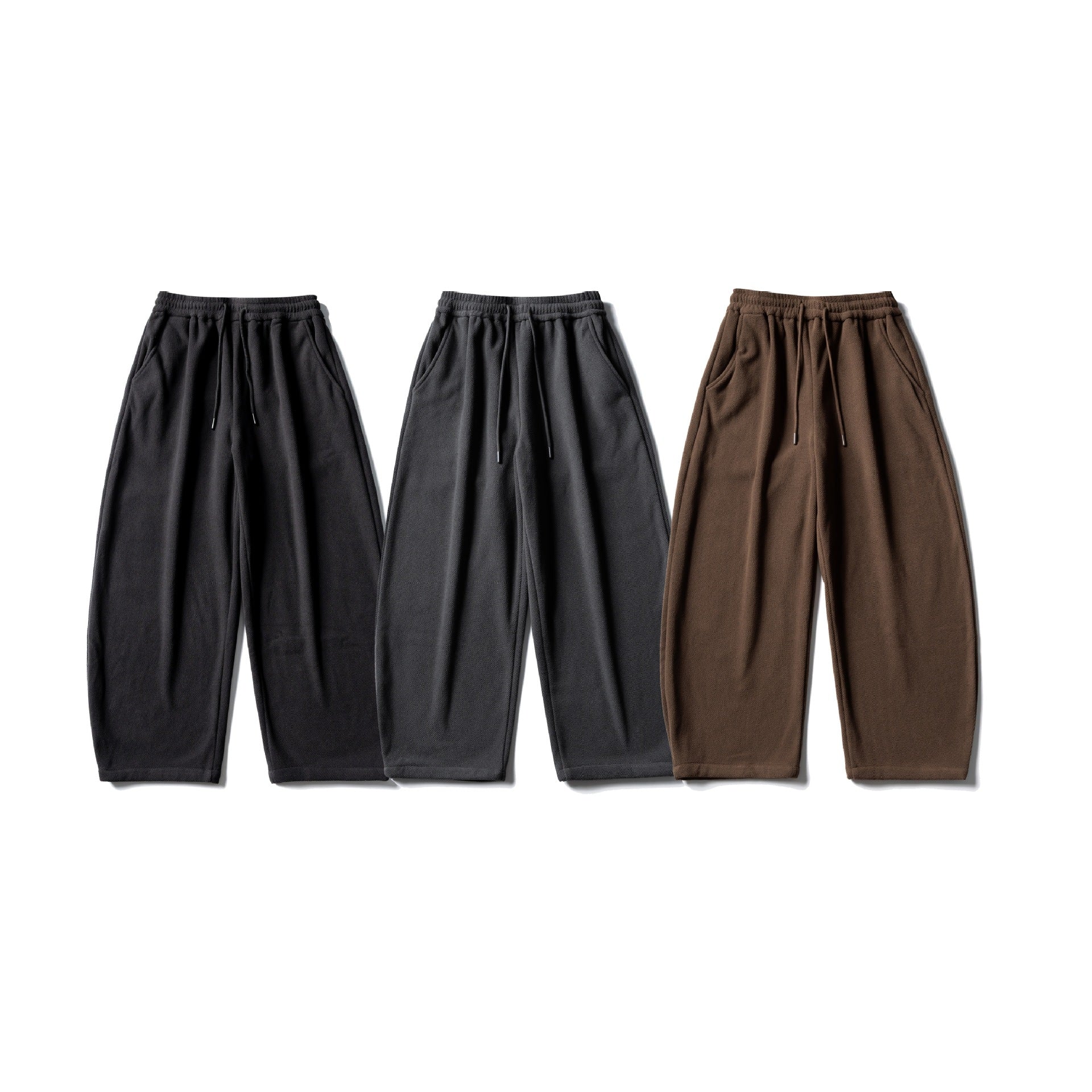 Unisex fleece jogging pants with elastic drawstring waistband, side pockets and tapered leg Chichicherry