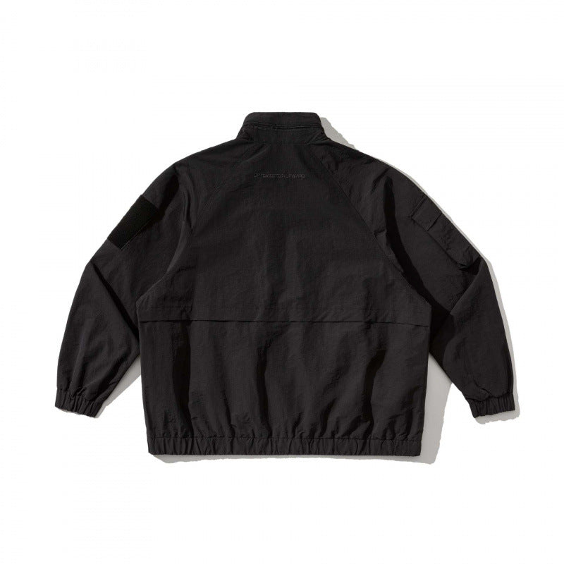 Unisex Oversize Utility Jacket with multifunctional pockets, high stand-up collar, and elastic hem Chichicherry