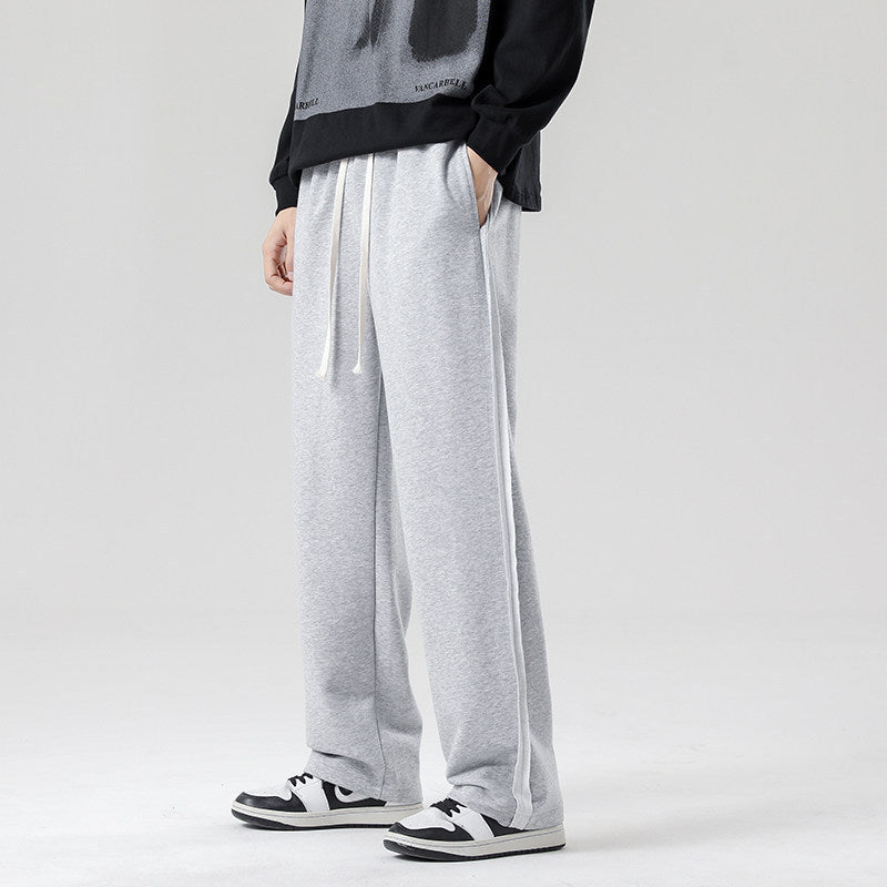 Men's wide jogging pants in oversized fit with side stripes, drawstring & fleece lining Chichicherry