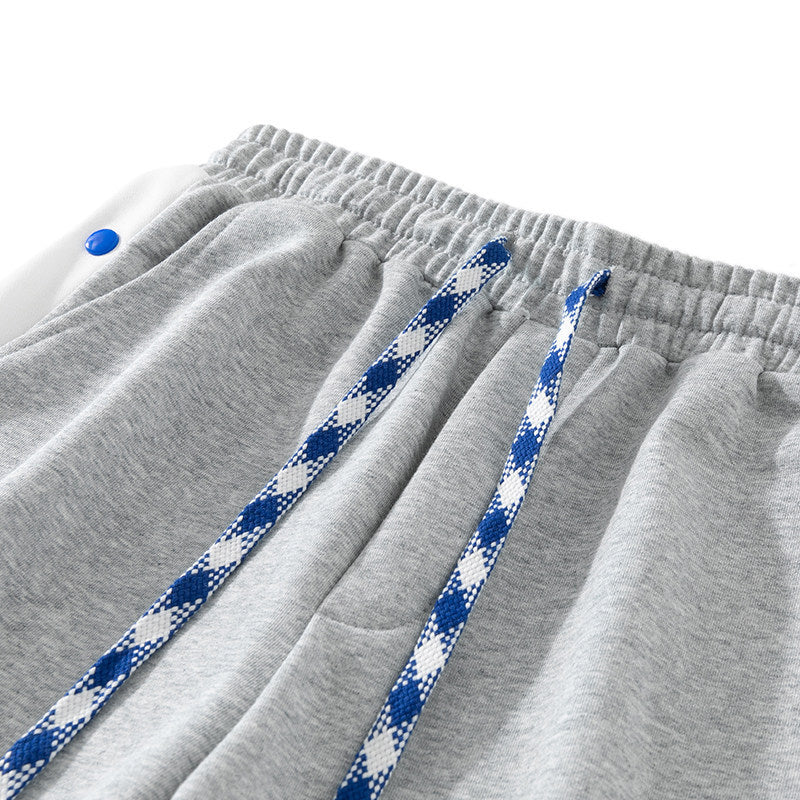 Men's jogging pants with snap button side stripes, elastic waistband & drawstring Chichicherry