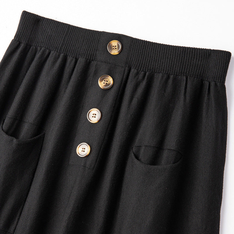 Women's midi skirt made of wool blend with A-line, elastic ribbed waistband, decorative button placket, and patch pockets Chichicherry