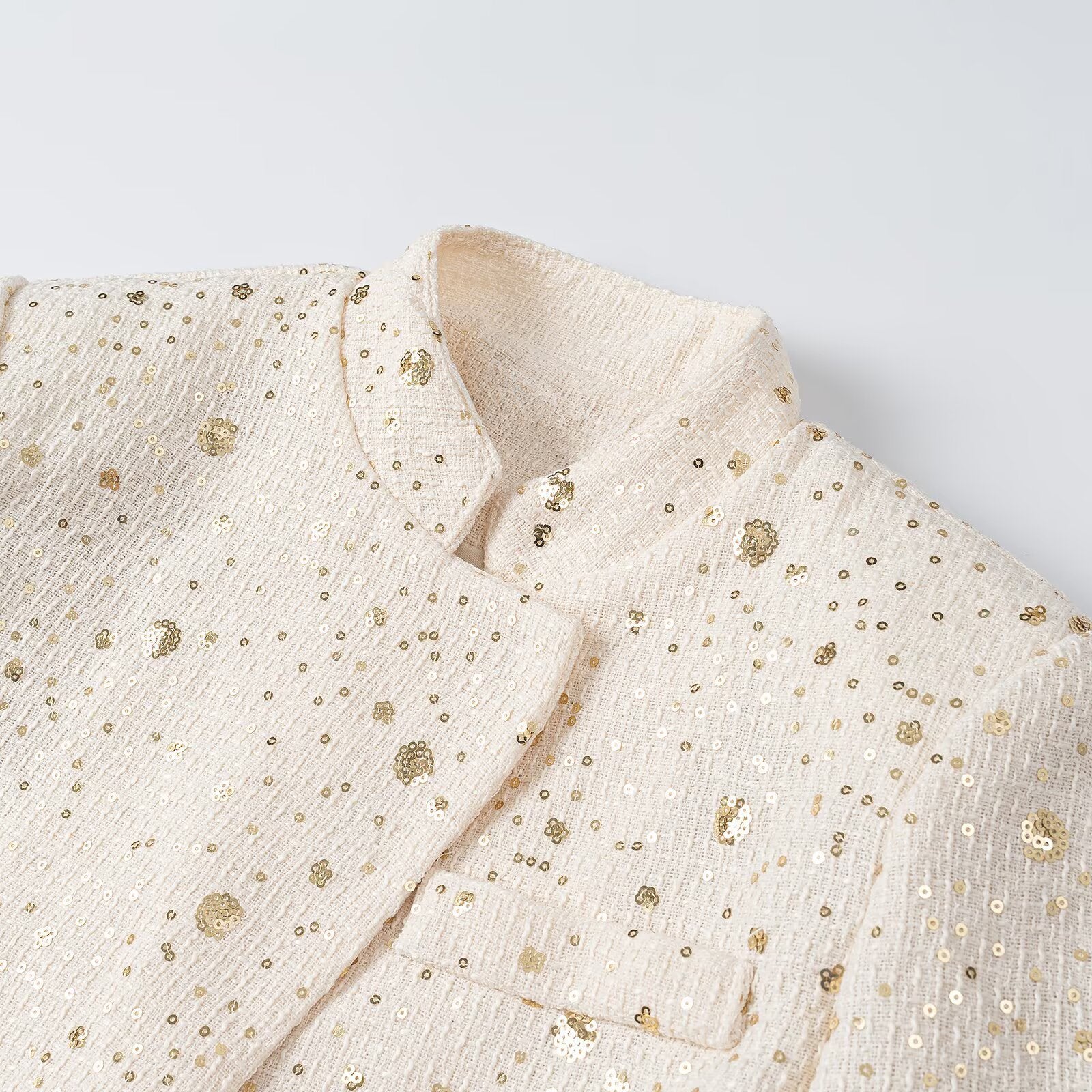 Women's short blazer in bouclé style with stand-up collar and sequin application Chichicherry